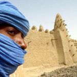 a-tuareg-nomad-stands-near-the-13th-century-mosque-at-timbuktu-mali-where-u-s-special-forces-have